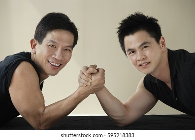 Two men ready to arm wrestle