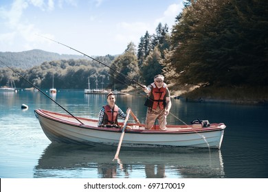 Two men relaxing and fishing 