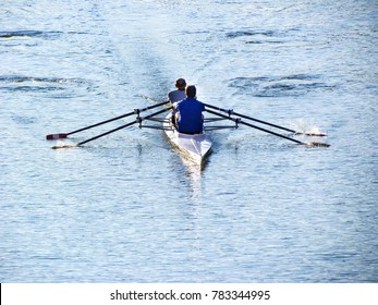 Two Men Row Doubles Sculling On A Calm River