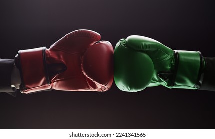 Two men's hands in boxing gloves. Confrontation concept - Powered by Shutterstock