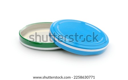 Two metal jar lids isolated on white.