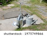 two metal (zinc) watering cans 