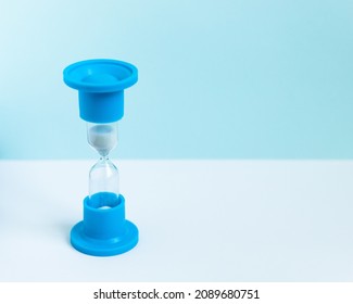 Two Minute Hourglass Medical Watch On A White-blue Background	
