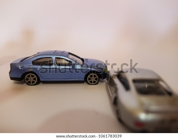 two model cars in accident. car insurance concept.\
selective focus.