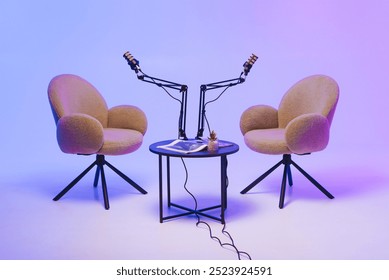 Two modern chairs with microphones set up for a podcast recording in a stylish studio at dusk - Powered by Shutterstock