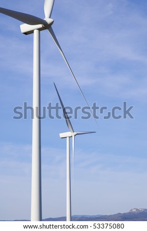 Similar – Foto Bild Windräder am Horizont unter dramatischem Himmel