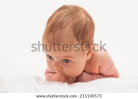 Two Month Old Baby Laying On His Tummy And Trying To Hold His Head Baby Two Month Old Baby Laying On His Tummy And Trying To Hold His Head Baby
