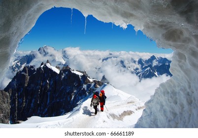 Two Mountaineers On A French Glacier (Mont Blanc Massif, French Alps)