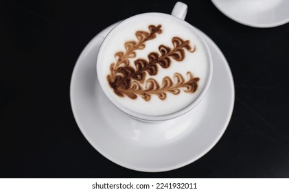 two mugs of coffee on the table. cappuccino with milk foam and espresso