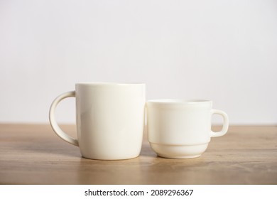 Two Mugs On The Table. Meeting And Dinner.