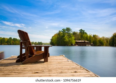 Two Muskoka Chairs Sitting On Wood Stock Photo 1096756619 | Shutterstock