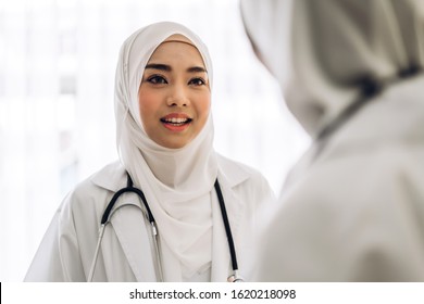 Two Muslim Asian Female Doctor Working And Talk In Hospital.healthcare And Medicine