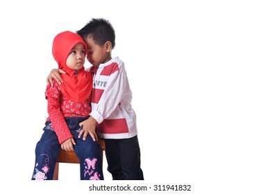 Two Muslim sibling kids 