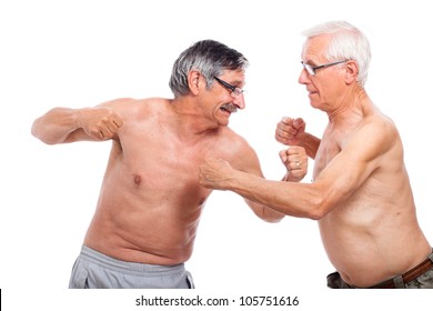 Two Naked Senior Men Fighting, Isolated On White Background.