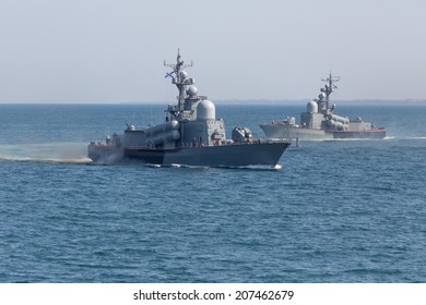 Two Naval Ships In The Sea. Russian Naval Ships On Day Of Russian Navy In Sevastopol (Crimea)