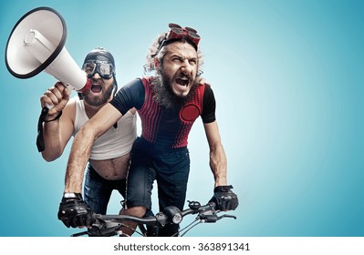 Two nerdy guys with a megaphone - Powered by Shutterstock