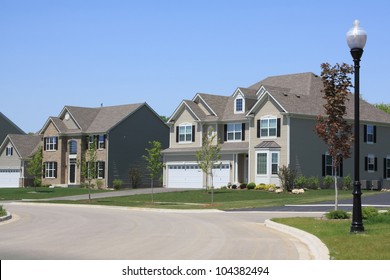 Two New Houses On A Suburban Street