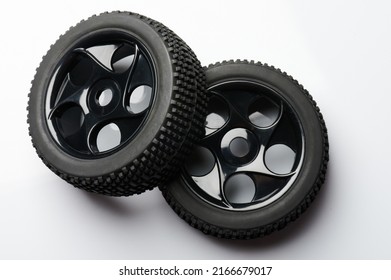 Two New Rc Car Wheels Isolated On Studio Background