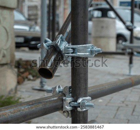 Two new scaffold double fix clamp and scaffold pipes for build the temporary structure close up