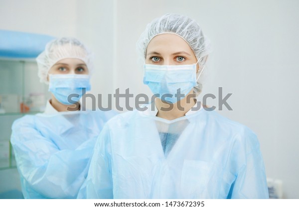 Two Nurses Preparing Surgery Operating Room Stock Photo