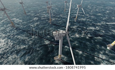 Two offshore workers on the top of the windmill, wind farm