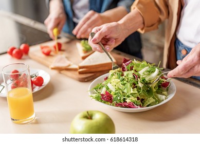 Two old women preparing healthy food - Powered by Shutterstock