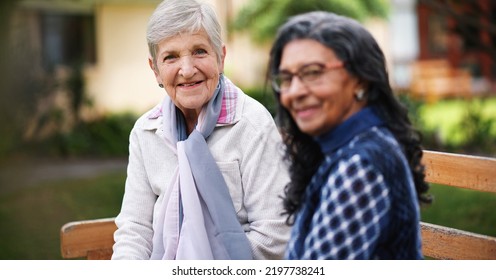 Two Old Women Sitting On Bench In Park Smiling Happy Life Long Friends Enjoying Retirement Together