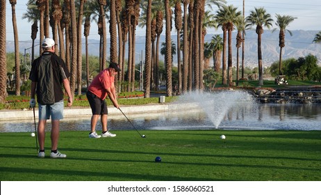 Two Older Men Play Golf At The JW Marriott Desert Springs Resort. Photo Taken In Palm Desert, CA / USA On November 14, 2019.