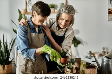 Two older women, a loving mature lesbian couple, working together in the garden. - Powered by Shutterstock