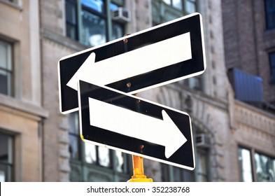 Two one-way signs on the street