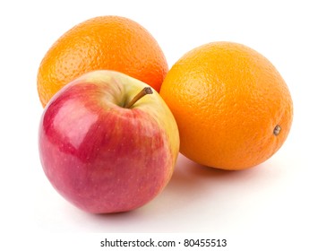 Two oranges and juicy apple isolated on white background