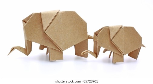 two origami elephants recycle paper