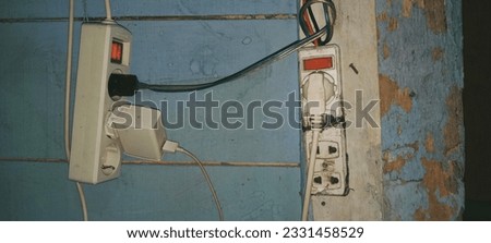 two outlets connected by several cables