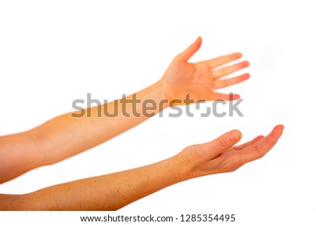 Two outstretched hands