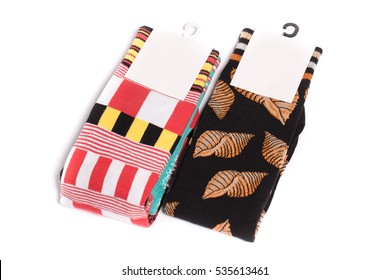 Two Pack Of Three Pair Of Socks With A Tag Isolated On A White Background