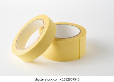 Two Painter's (masking) Tapes Of Different Widths On A White Background. Painting Tool