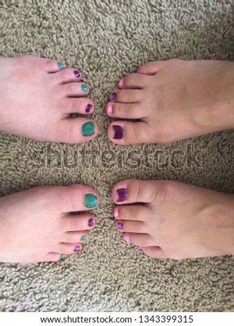Two pairs of feet