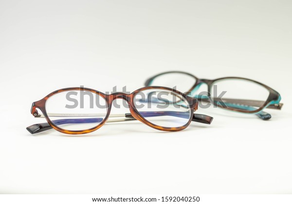 two-pairs-modern-glasses-isolated-studio-stockfoto-1592040250