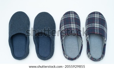 Two pairs of new slippers.