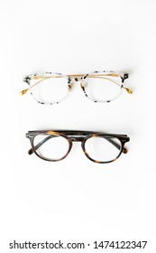 Two Pairs Of Tortoise Shell Glasses On White Background, Isolated Glasses