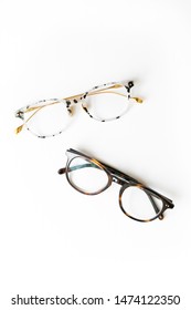 Two Pairs Of Tortoise Shell Glasses On White Background, Isolated Glasses