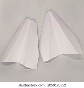 Two Paper Planes On A White Background