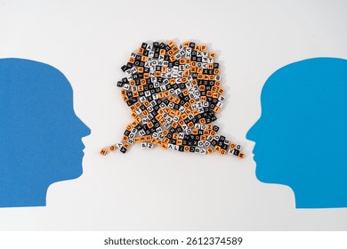 Two paper-cut heads facing each other, with streams of mixed letters flowing from their mouths—symbolizing complex communication, shared thoughts, and the exchange of ideas or emotions or quarrel
