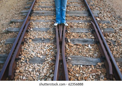 two parallel railways with two legs in the middle