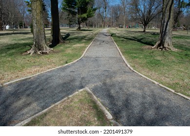 Two Paths Converge Together Or There Is A Fork In The Path Leading In Different Directions. A Path Leads Through Phelps Grove Park In Springfield, Missouri. More Images At OzarkStockPhotography.com