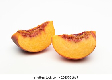 Two Peach Wedges, Isolated On White Background