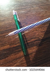Two pens on the table.
