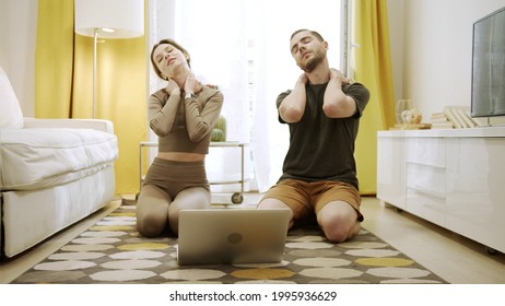 Two People Are Doing Neck Exercises