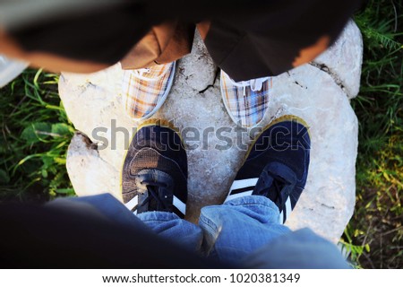 two people Feets From Above Concept, Person barefoot Standing on a Meadow at hot summer day, Point of view shot
