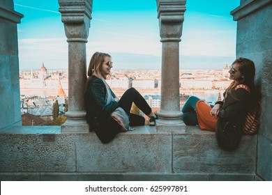 Two People At Fisherman's Bastion In Budapest, Hungary. Toned Image. Artistic Grain Applied.